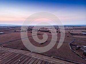 Aerial view of a rural field in the morning