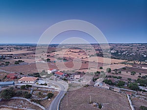 Aerial view of a rural field in Sicily at early sunrise