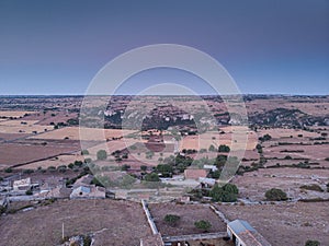 Aerial view of a rural field in Sicily at early sunrise