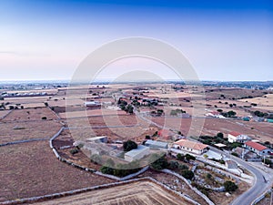 Aerial view of a rural field in Sicily at early sunrise