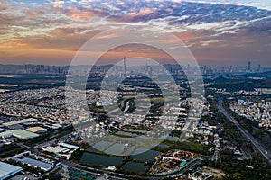 Aerial View of rural green fields in Hong Kong border and skylines in Shenzhen