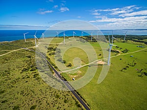 Aerial view of rural road and wind farm in Australia.