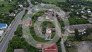 Aerial view of rural roads. View of rice fields along the road. The road passing cultivated area, countryside.