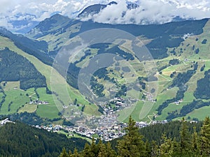 Aerial view on Saalbach village and mountains in Saalbach-Hinterglemm skiing region in Austria on a beautiful summer day