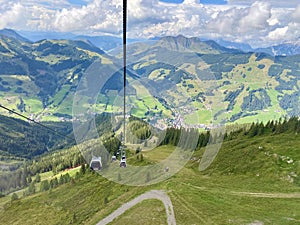 Aerial view on Saalbach village and mountains in Saalbach-Hinterglemm skiing region in Austria on a beautiful summer day