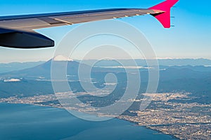 Aerial view of Sagami Bay with Mount Fuji ( Mt. Fuji ) in background and blue sky