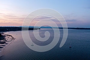 Aerial view of sailboats on the Puget Sound at sunset