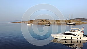 aerial view sailboats and yacht sea in evening sunlight or sunrise over beautiful mountains Coast, luxury summer