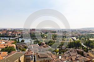 Aerial view of Salamanca from roof of new Cathedral, with roman bridge and  Enrique Estevan bridge over Tormes river, Community of photo