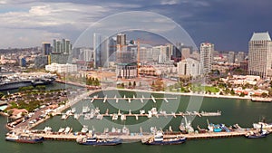 Aerial view of the San Diego skyline and the USS Midway Museum.