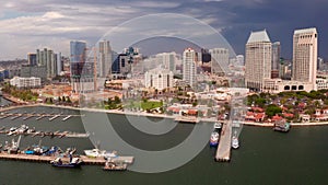 Aerial view of the San Diego skyline and the USS Midway Museum.