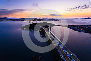 Aerial view of San Francisco Oakland Bay Bridge at sunset