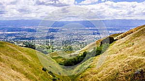 Aerial view of San Jose, part of Silicon Valley; golden hills visible in the foreground; South San Francisco bay area, California