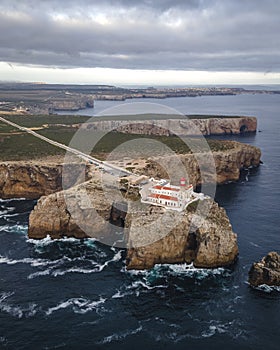 Aerial view of the San Miguel Lighthouse facing the Atlantic ocean, Sagres, Algarve, Portugal. photo