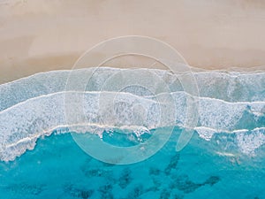 Aerial view of sand beach, ocean texture background