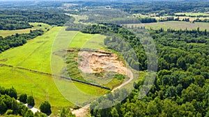 Aerial view of a sand mining site in an agricultural field