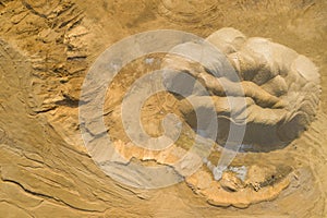 Aerial view of sandpit and factory plant producing sand materials for construction industry. Top view of industrial place. Photo