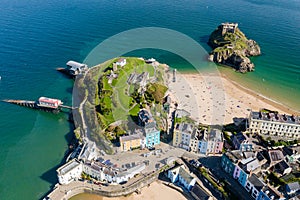 Aerial view of a sandy beach in a picturesque resort Castle Beach, Tenby, Wales