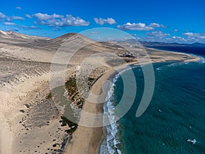 Aerial view on sandy dunes and turquoise water of Sotavento beach, Costa Calma, Fuerteventura, Canary islands, Spain