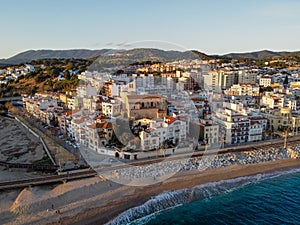 Aerial view of Sant Pol de Mar village and its church Ermita de Sant Jaume. Located in el Maresme coast, Catalonia