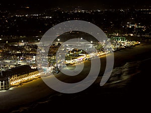 Aerial view of Santa Cruz Beach Boardwalk, California, USA illuminated at night