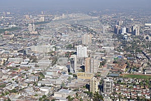 Aerial view of the Santiago city with the blue smog from the San Cristobal Hill, Santiago, Chile