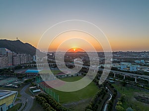 Aerial view of Sanxia District with cars on highway during sunset in New Taipei City, Taiwan