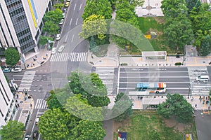 Aerial view from Sapporo TV Tower of street road and intersection in Sapporo City nearly Odori Park.