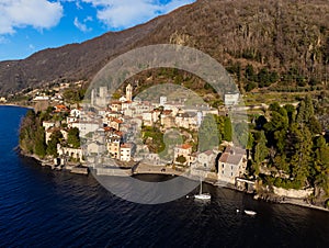 AERIAL VIEW. Scenic picture, postcard view from the lake of a little old village