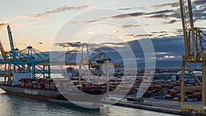 Aerial view of the sea cargo port and container terminal of Barcelona timelapse, Barcelona, Catalonia, Spain.