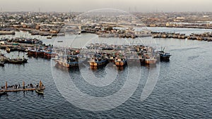 Aerial view of the sea and a harbor with boats, Karachi coast, Pakistan