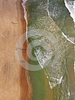 Aerial View of the sea and people in the sand at Praia do Futuro Beach, Fortaleza, CearÃÂ¡ Brazil photo