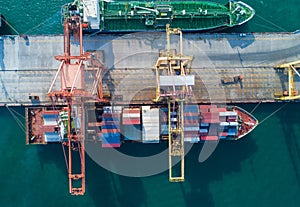 Aerial view sea port Container cargo loading ship in import export business logistic. Freight transportation.
