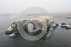 Aerial View of Sea Stack and Arch Off Coast of California