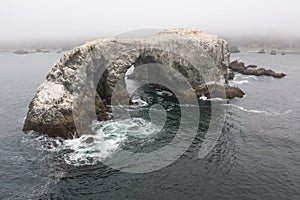 Aerial View of Sea Stack and Natural Arch in California
