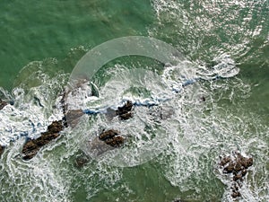 Aerial view of sea waves and fantastic Rocky coast, Thailand