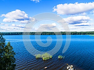 Aerial view of seashore with beach, lagoons. Coastline with sand and water. Landscape. Aerial photography. Birdseye. Sky, clouds.