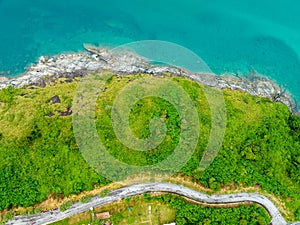 Aerial view seashore with mountains at Phuket Thailand, Beautiful seacoast view at open sea in summer season,Nature recovered