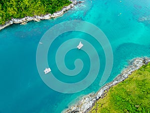 Aerial view seashore with mountains at Phuket Thailand, Beautiful seacoast view at open sea in summer season,Nature recovered