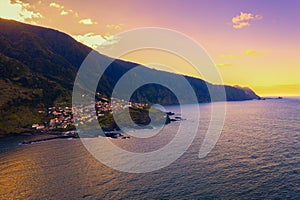 Aerial view of Seixal beach village on Madeira, Portugal at sunset