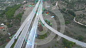 Aerial view of self driving autonomous cars with hud elements on city highway. Futuristic intelligent traffic detection