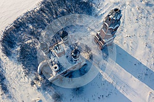 Aerial view of a semi-destroyed abandoned church in the Yaroslav region in winter, Russia