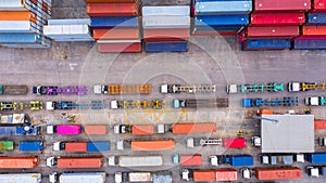 Aerial view of semi truck and trailer loading at logistic center, Business freight shipping import export transportation by semi