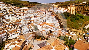 Aerial view of Setenil de las Bodegas, Andalusia. It is famous for its dwellings built into rock overhangs above the river