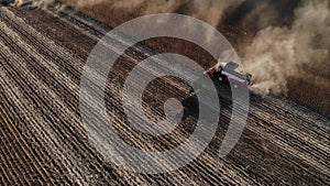 Aerial view of several harvesters on a field of sunflowers. Harvesting sunflower seeds for sunflower oil production