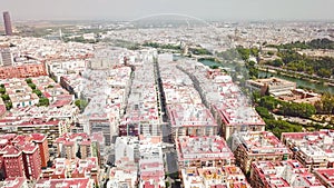 Aerial view of Seville city, the capital of AndalucÃ­a. Flying above the buildings