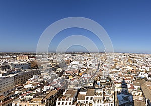 Aerial view of Seville city and Cathedral of Saint Mary of the See in Seville as see from seen from the Giralda tower. Seville,