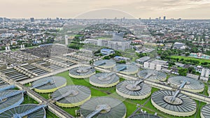 Aerial view sewage treatment plant near downtown