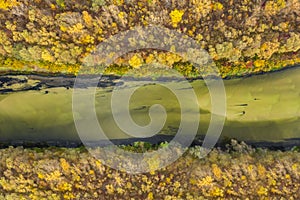 Aerial view of the Seym River at Baturyn in Ukraine. Beautiful autumn river landscape. Top view.