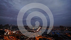 Aerial view of shanghai nanpu overpass traffic interchange at night,time lapse.